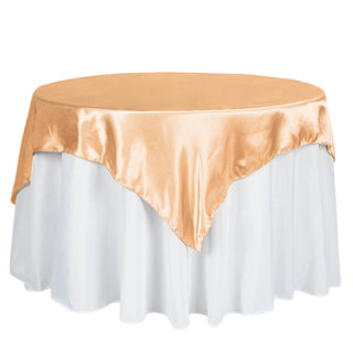 Elevate Your Event with the 60x60 Peach Square Smooth Satin Table Overlay