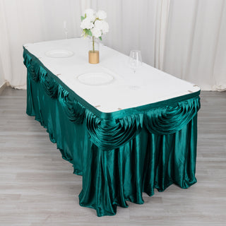Make a Statement with the 14ft Peacock Teal Pleated Satin Double Drape Table Skirt
