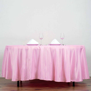 Add Elegance to Your Event with the 108" Pink Seamless Polyester Round Tablecloth