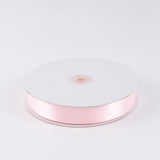 Pink satin ribbon spool on white background#whtbkgd