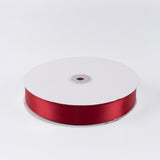 Red satin ribbon spool on white background#whtbkgd