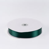 Green satin ribbon spool on a white background#whtbkgd
