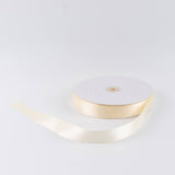 Cream satin ribbon roll on white background