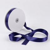 Purple satin ribbon spool on white background