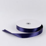 Purple satin ribbon spool on a white background