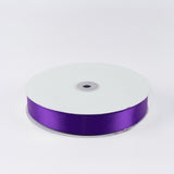 Purple satin ribbon spool on white background#whtbkgd
