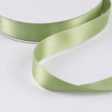 Light green satin ribbon on white background