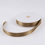 Gold satin ribbon roll on white background