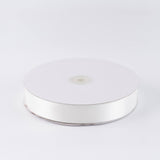 White satin ribbon roll on spool isolated on white background#whtbkgd