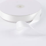 White satin ribbon spool on a white background, close-up product shot