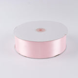 Light pink satin ribbon spool on white background#whtbkgd