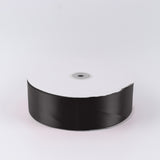 Black satin ribbon spool on white background#whtbkgd