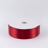 Red satin ribbon spool on white background#whtbkgd