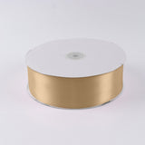 Gold satin ribbon roll on white background#whtbkgd