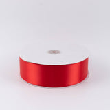 Red satin ribbon spool on white background#whtbkgd