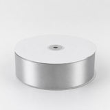 White satin ribbon roll on a spool, isolated on white background#whtbkgd