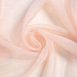 Soft peach abstract fabric swirl background with pastel folds#whtbkgd
