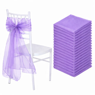 Purple chair sashes and napkins stacked for elegant event decor