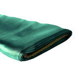 Green satin ribbon roll on a plain background #whtbkgd