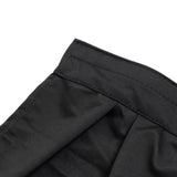 Black ribbed waistband on pants close-up, minimalist fashion detail#whtbkgd