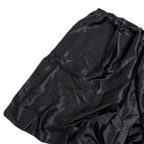 Black satin fabric draped on a white background#whtbkgd