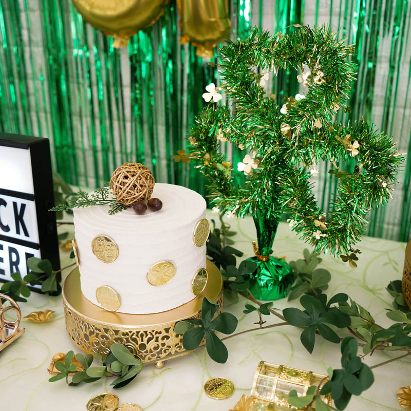 St. Patrick's Day dessert table with party signage