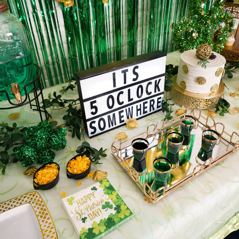 St. Patrick's Day table with drink dispenser and sign