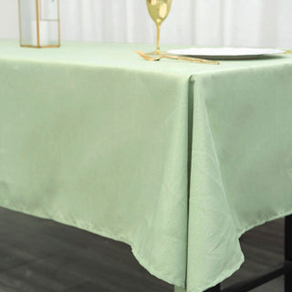 Experience Durability and Style with the 60x102 Sage Green Seamless Polyester Rectangular Tablecloth