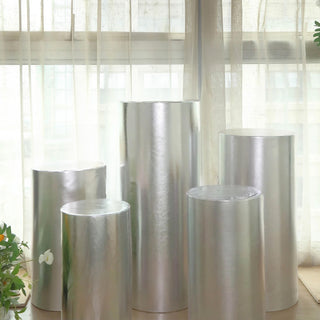 Elevate Your Event with Metallic Silver Pedestal Covers