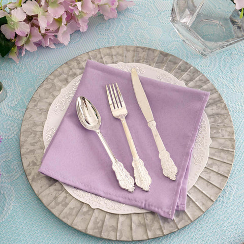 Lavender napkin place setting with silver cutlery