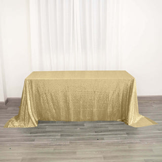 Elevate Your Event with the 90"x132" Champagne Seamless Premium Sequin Rectangle Tablecloth