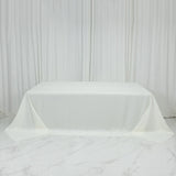 White tablecloth draped elegantly over a table.