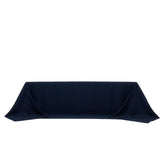 Navy blue tablecloth on a plain white backdrop