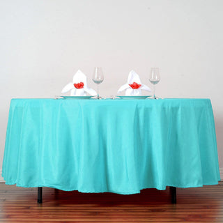 Elevate Your Event Decor with the 108" Turquoise Seamless Polyester Round Tablecloth