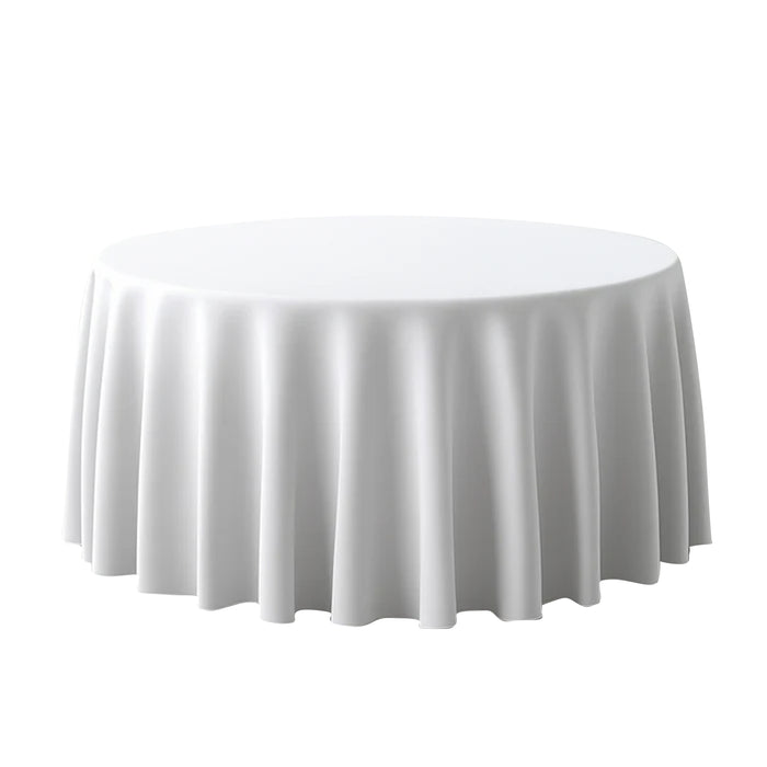 Round white table with elegant draped tablecloth