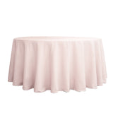 Round pink tablecloth on a white backdrop for elegant dining settings.