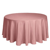 Round pink tablecloth draped elegantly over a table.