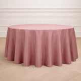 Round pink tablecloth draped elegantly over a table.