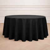 Black round tablecloth draped elegantly over a circular table.