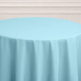 Blue tablecloth draped elegantly over a round table.