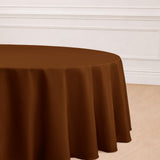 Brown round tablecloth draped elegantly on a table.