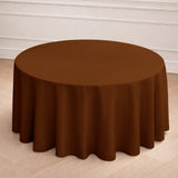 Brown round tablecloth on a wooden floor.