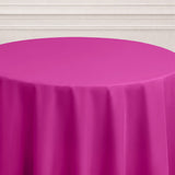 Pink round tablecloth with pleated design