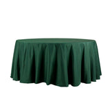 Green round tablecloth on a plain white background