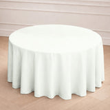 Round white tablecloth draped elegantly on a table.