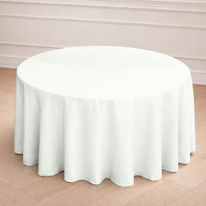 Round white tablecloth draped elegantly on a table.