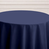 Navy blue tablecloth draped elegantly over a round table.