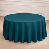 Teal round tablecloth draped elegantly over a table.