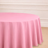 Pink round tablecloth draping elegantly over a table.