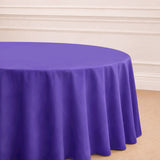 Purple round tablecloth draping elegantly on a table.